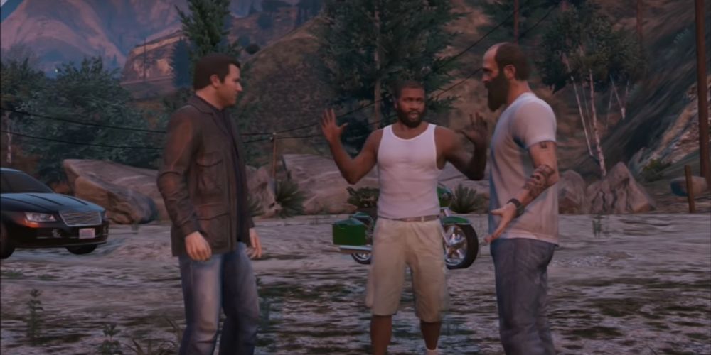 Mike, Franklin, and Trevor talk in the mountains in GTA V