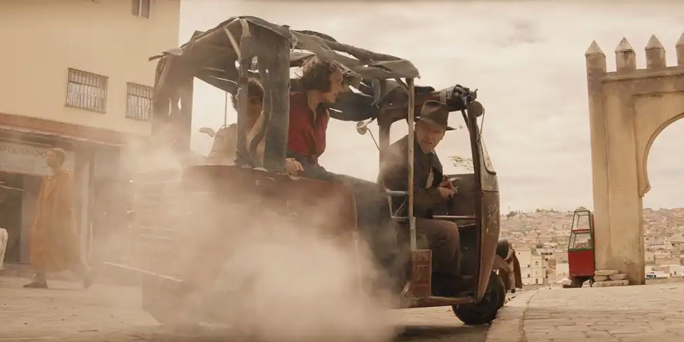 Harrison Ford driving a tuk-tuk with Helena in Indiana Jones and the Dial of Destiny.