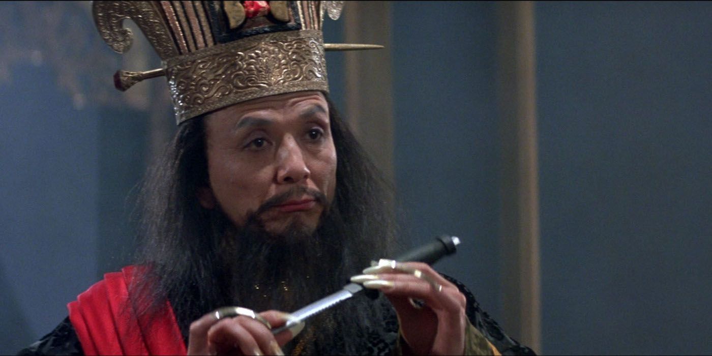 James Hong In Big Trouble In Little China holding a dagger
