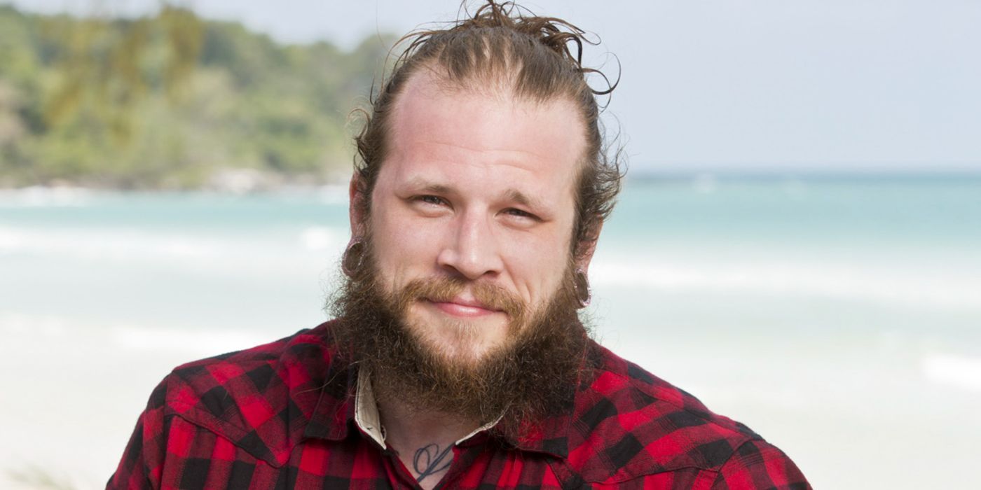 Jason smiling on the beach on Survivor