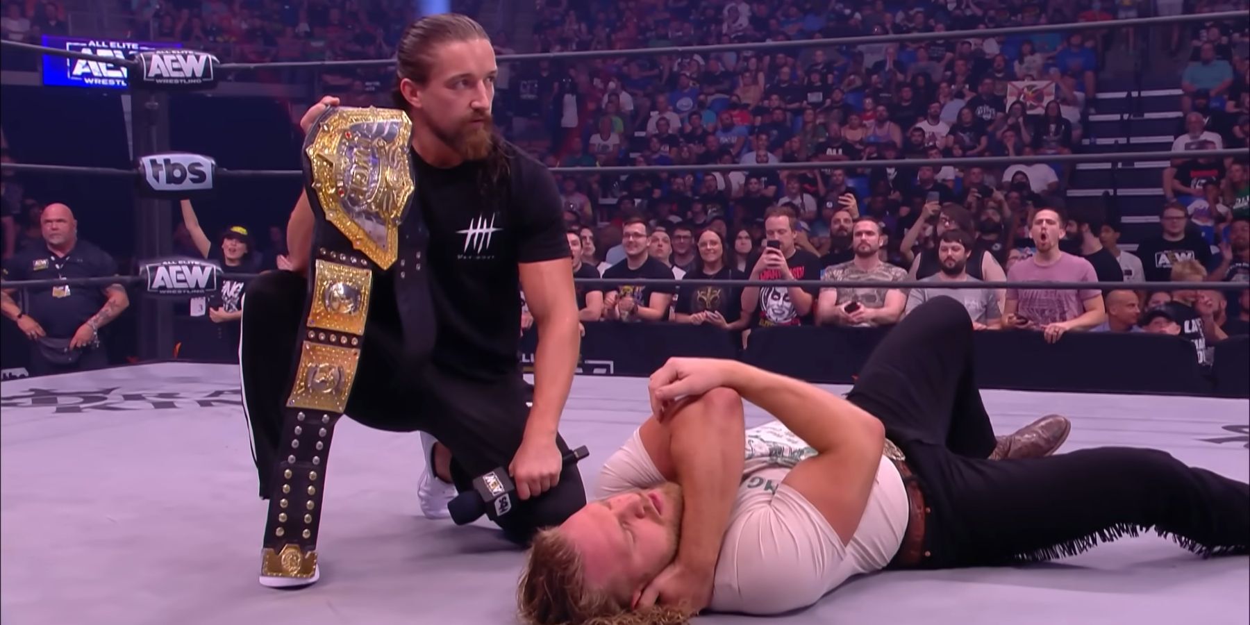 Jay White attacks Hangman Adam Page during the build toward AEW x NJPW Forbidden Door in 2022.