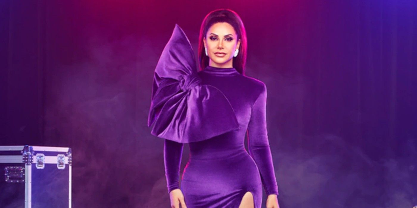 Jennifer Aydin from RHONJ season13 dressed in purple gown