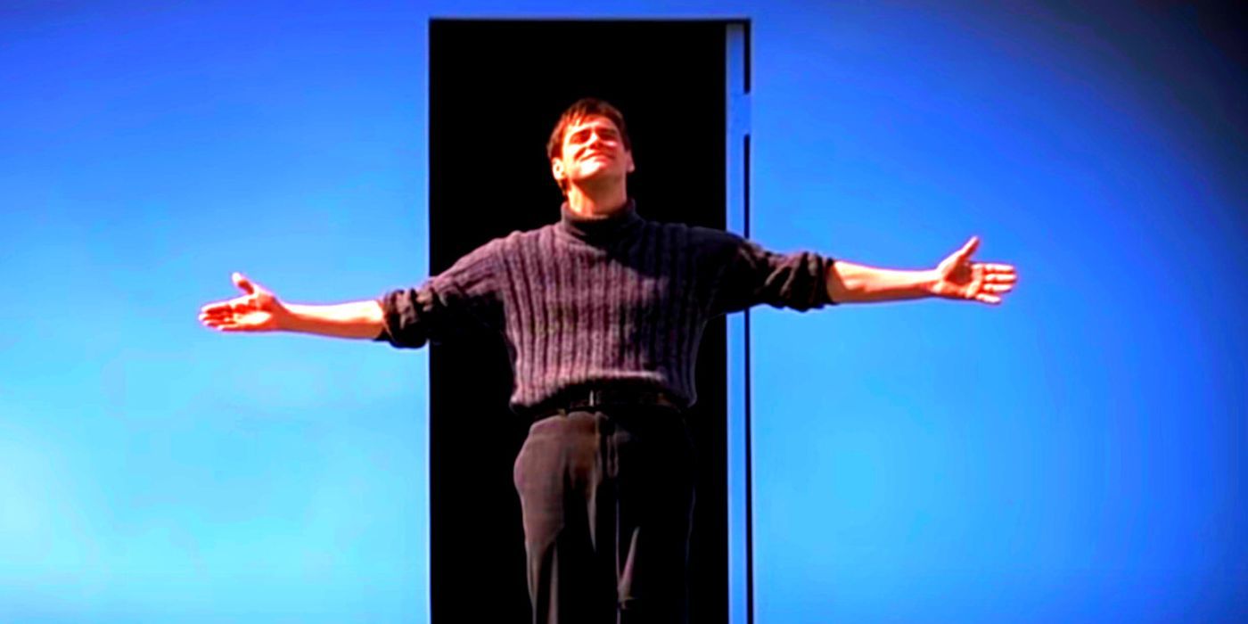 Truman Burbank standing in front of the exit door to his reality series in The Truman Show's ending