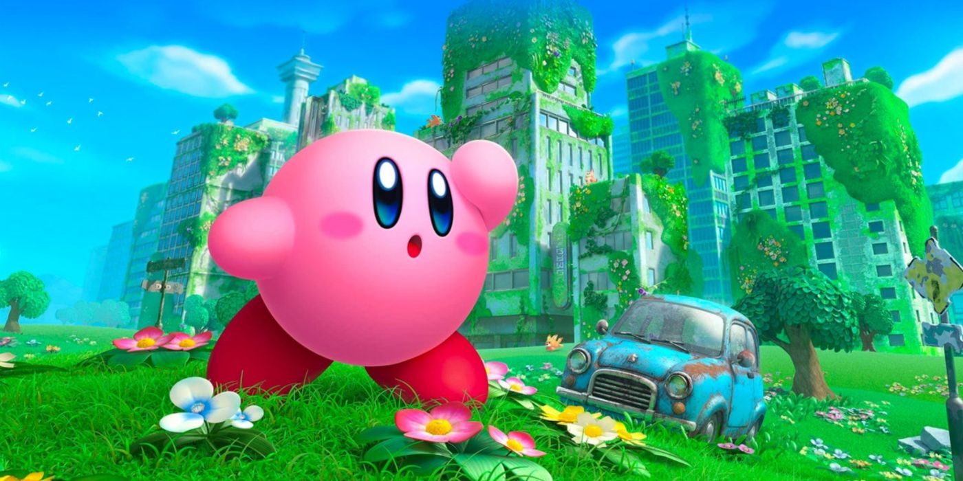 Kirby and the Forgotten Land key art featuring the titular character and the abandoned city in the background.