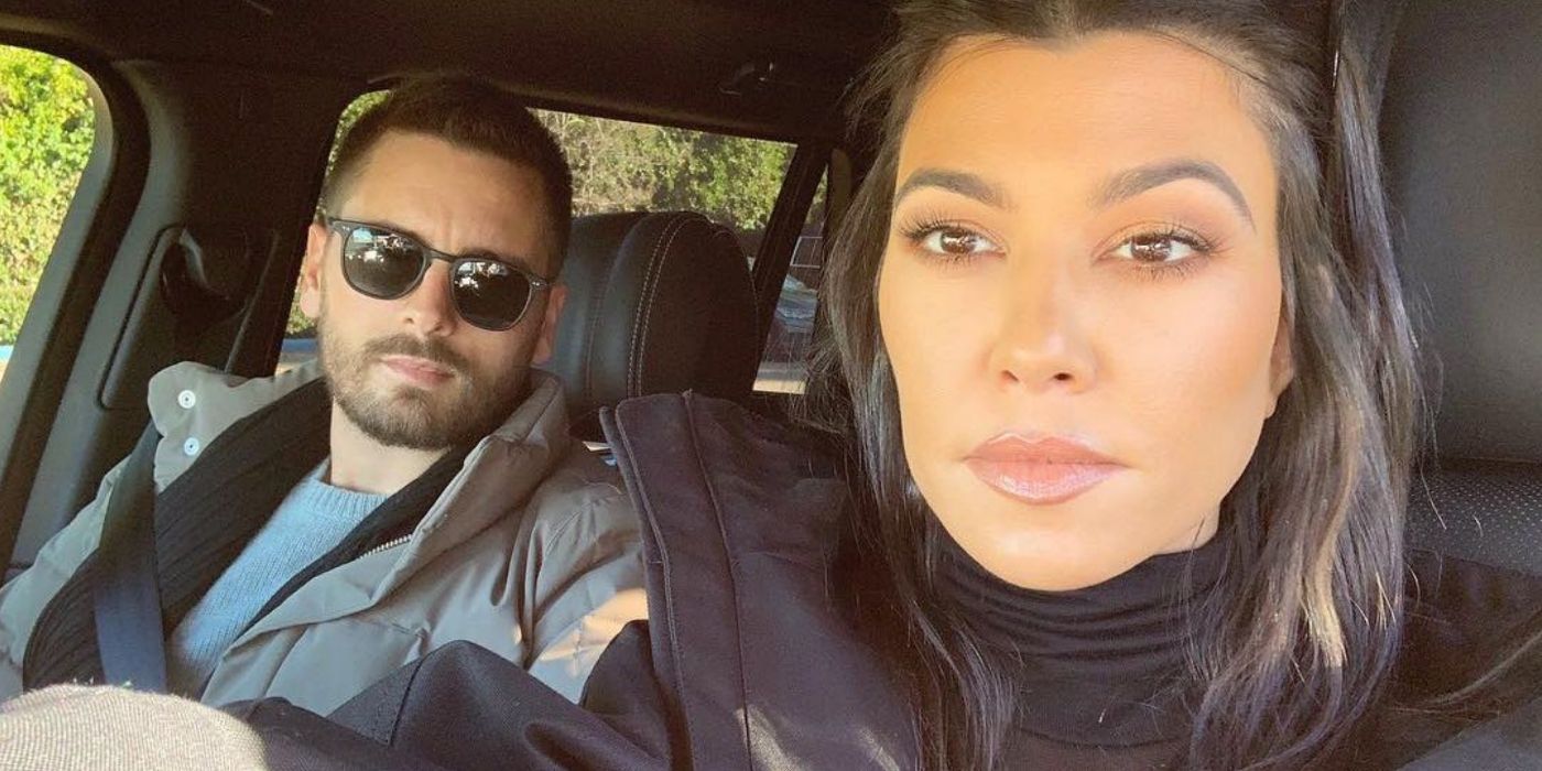The Kardashians' kourtney kardashian and scott disick in a car posing for a serious selfie