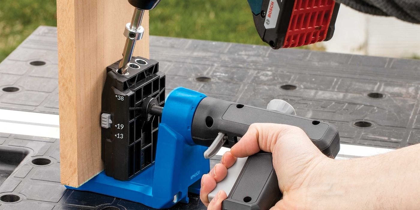 A person uses a Kreg Pocket Hole Jig