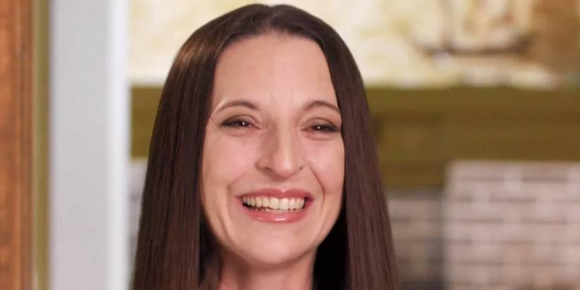 Kris Foster from 90 Day Fiancé: The Other Way season 4 smiling close up