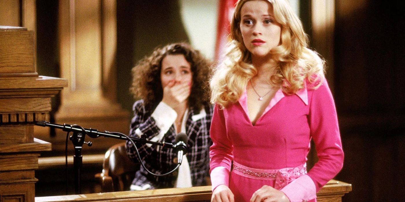 Chutney holding her hand to her mouth in court with Elle in Legally Blonde