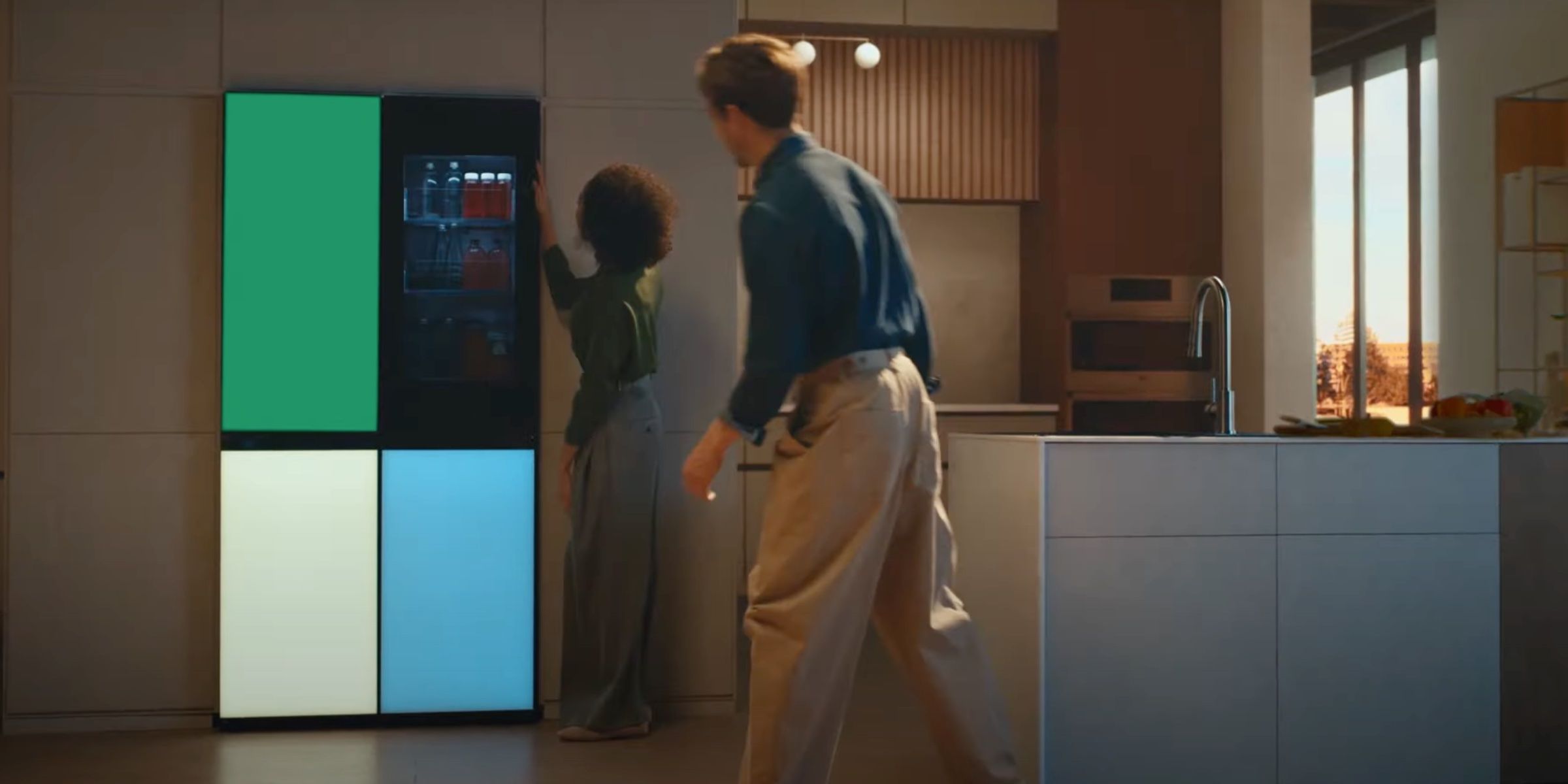 LG's MoodUp fridge in a kitchen, changing the color LEDs on each panel.