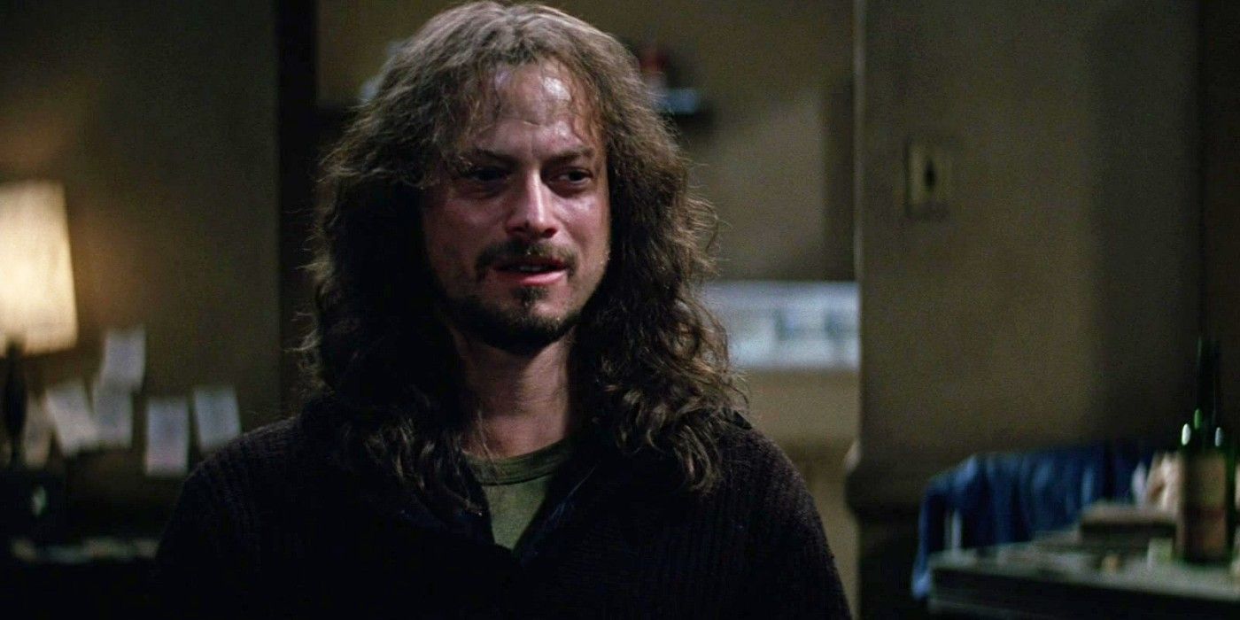 Lieutenant Dan (Gary Sinise) at Forrest's room looking sad in Forrest Gump.