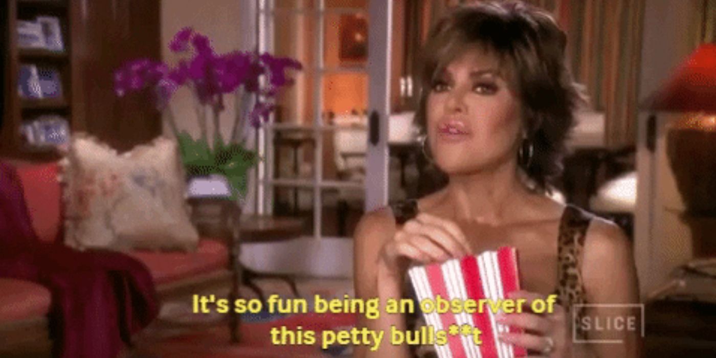 Lisa Rinna eating popcorn in a confessional
