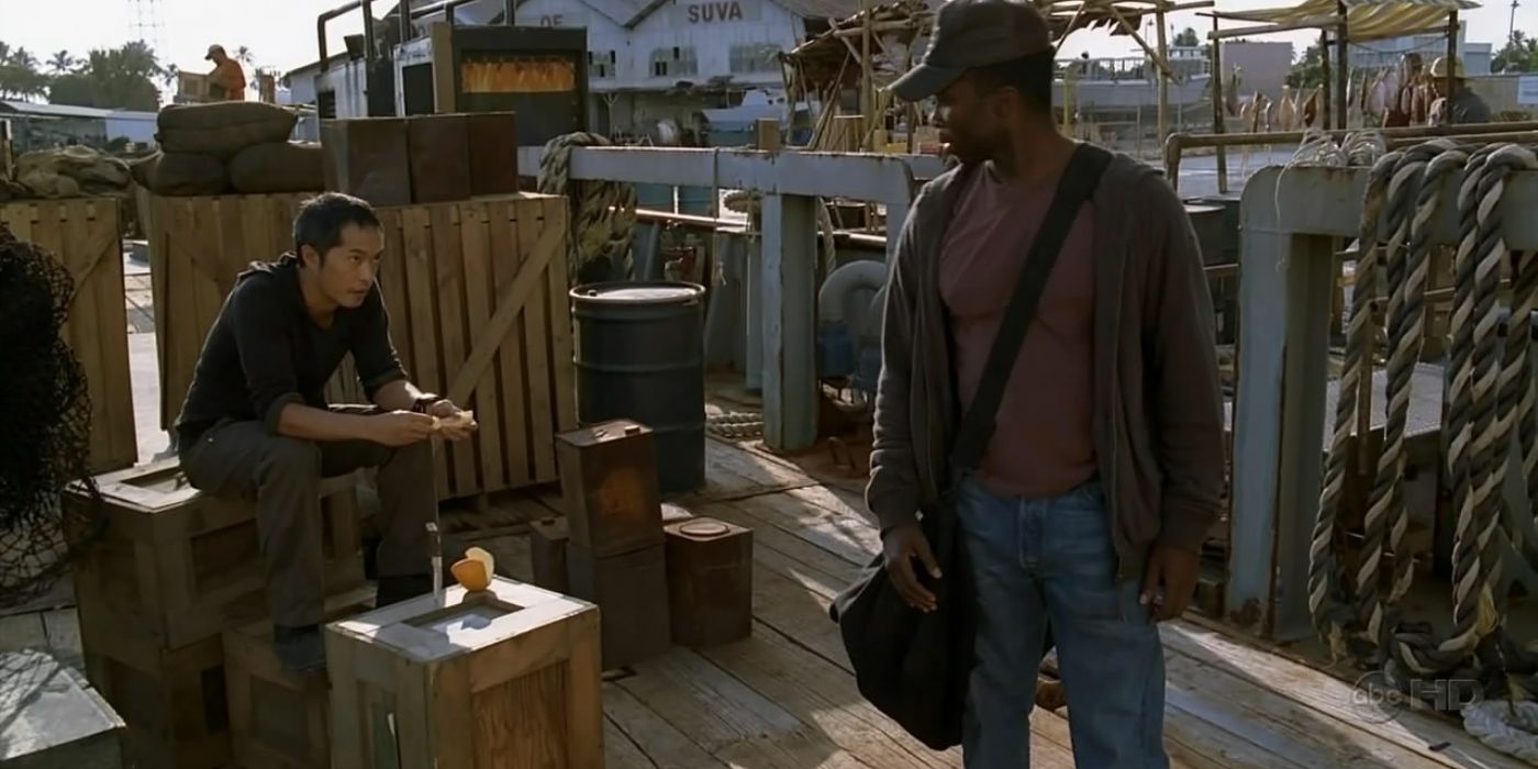 Jin and Michael standing near a boat in Lost