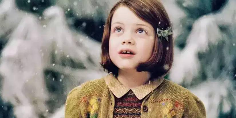 Georgie Henley as Lucy Pevensie amazed at seeing Narnia for the first time in the Chronicles of Narnia.