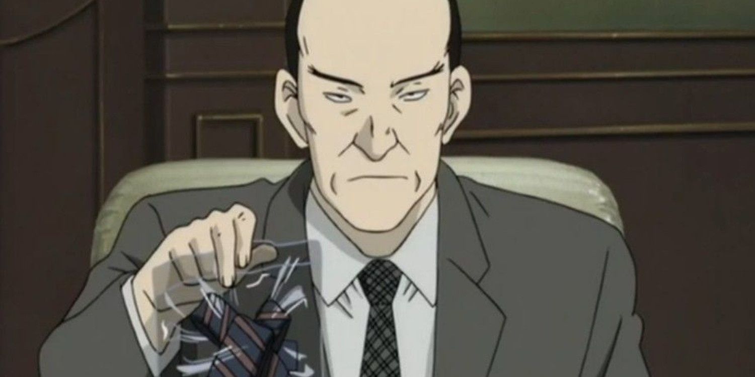 An unsmiling Heinrich Lunge holds up a tie in an evidence bag in Monster.