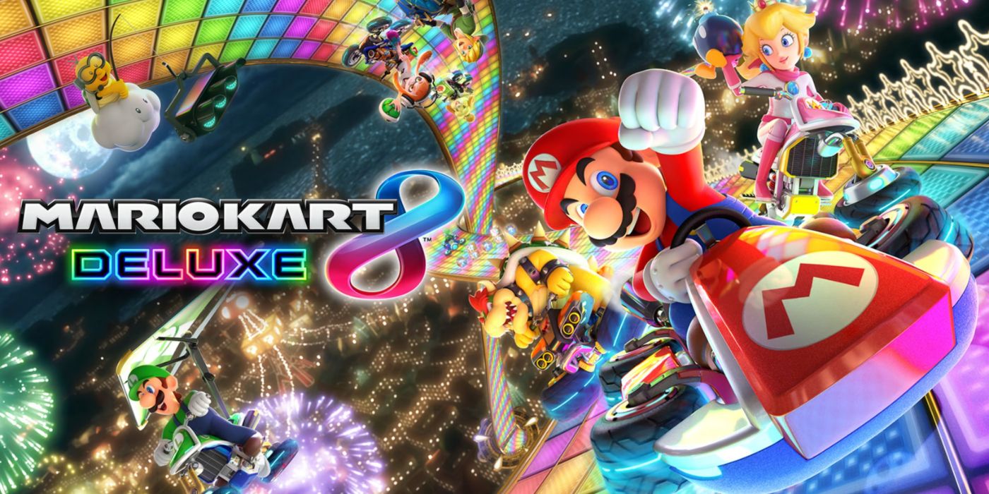 Seni kunci Mario Kart 8 Deluxe menampilkan Mario dan rekan.  balapan di Rainbow Road yang diterangi lampu neon.