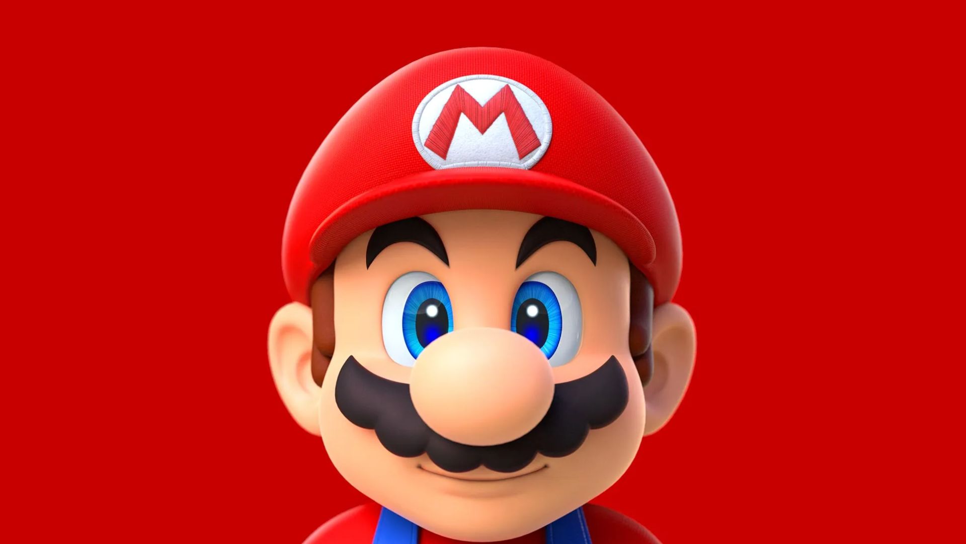 Mario smiling in red key art for Super Mario Run on mobile.