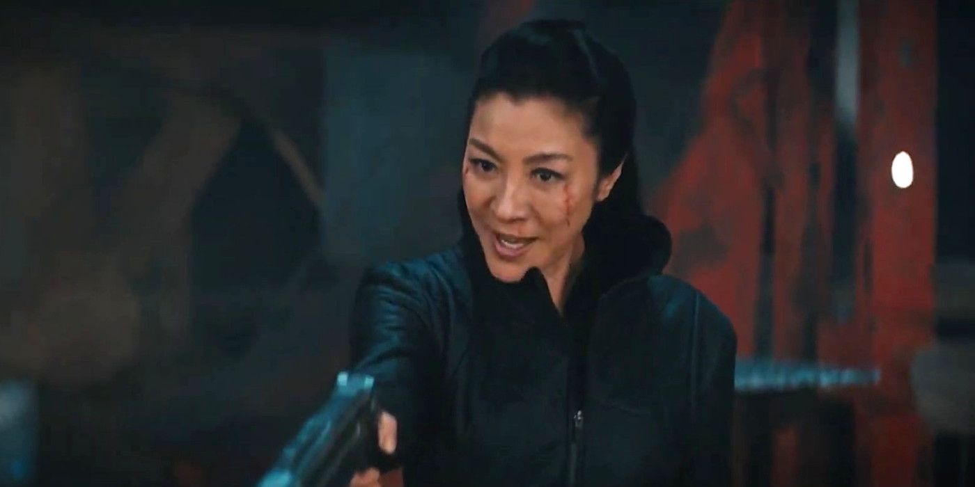 Michelle Yeoh As Georgiou in Star Trek Discovery taunting her enemies while pointing a weapon