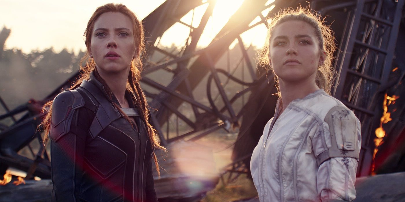 Natasha and Yelena standing amidst wreckage in Black Widow.