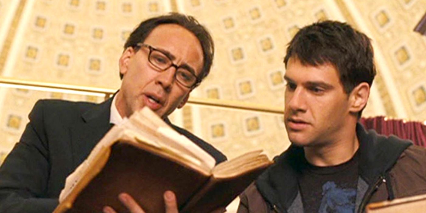 Nicolas Cage and Justin Bartha read a book in National Treasure: Book of Secrets.