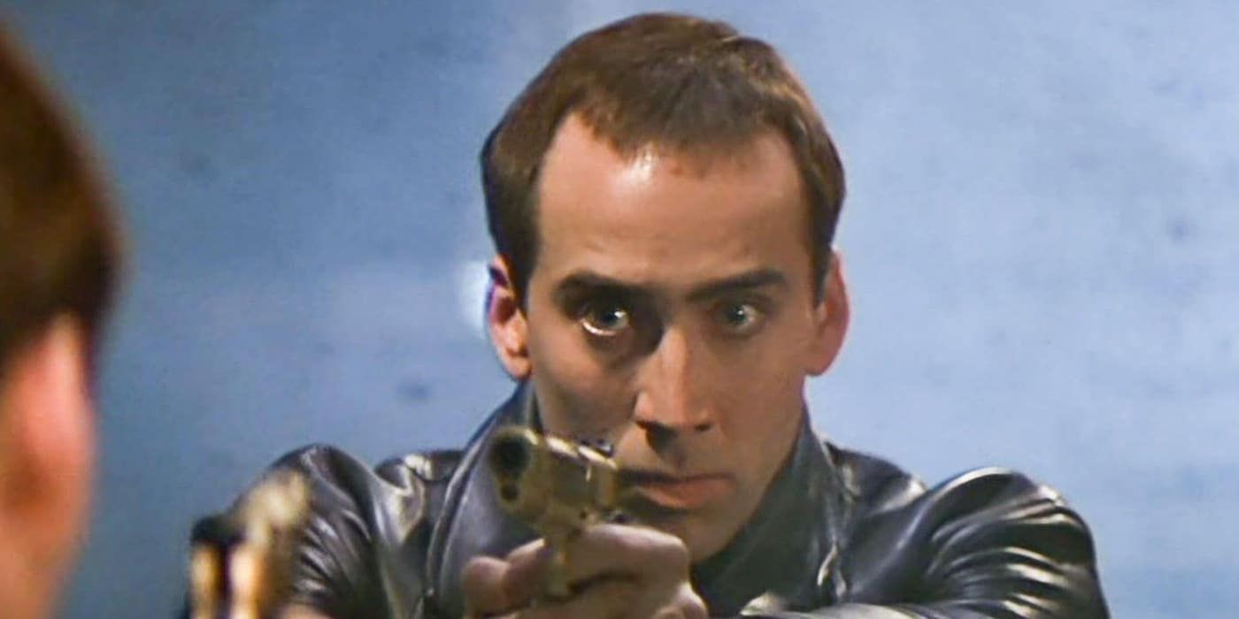 Nicolas Cage in Face/Off with a gun