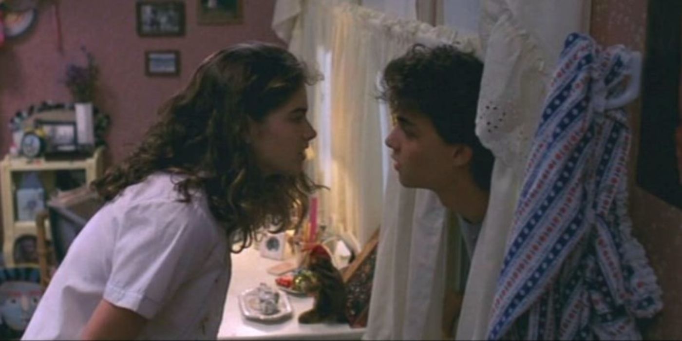 Nancy and Glen talking in Nancy's bedroom in A Nightmare On Elm Street