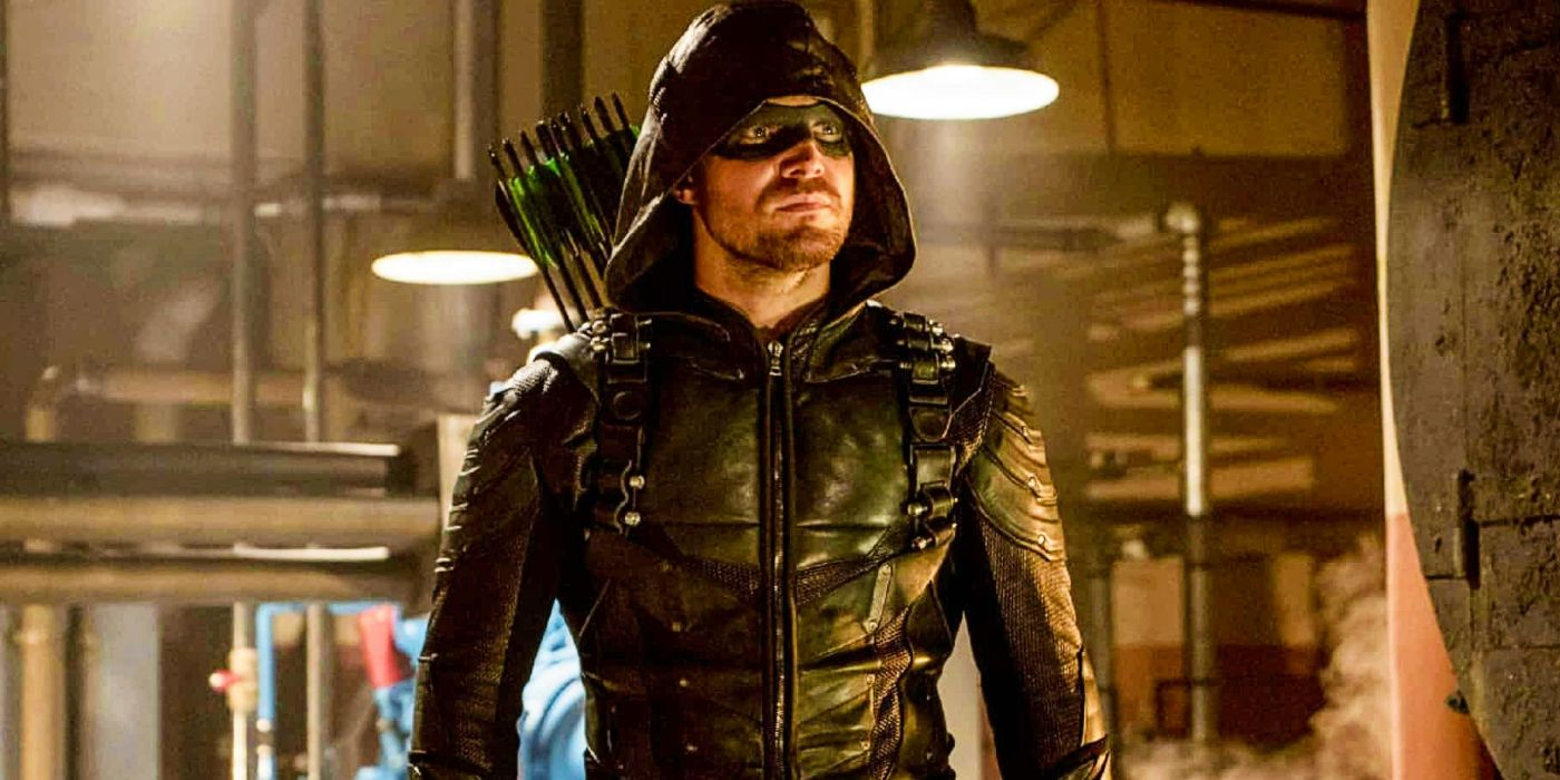 Oliver looks sternly at someone in his suit in the Green Arrow