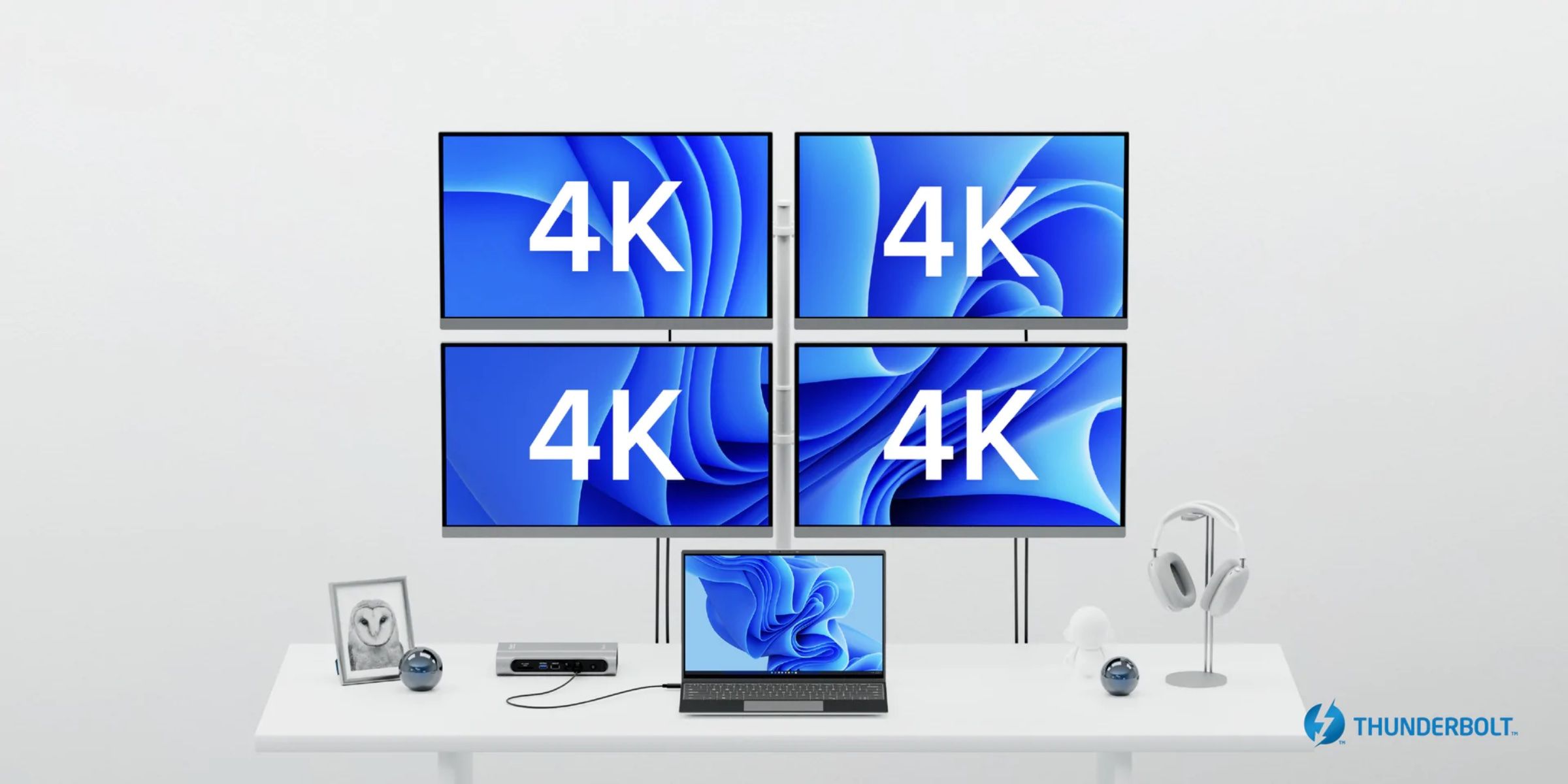 Plugable's 16-in-1 Thunderbolt Hub connecting a laptop to four external displays.