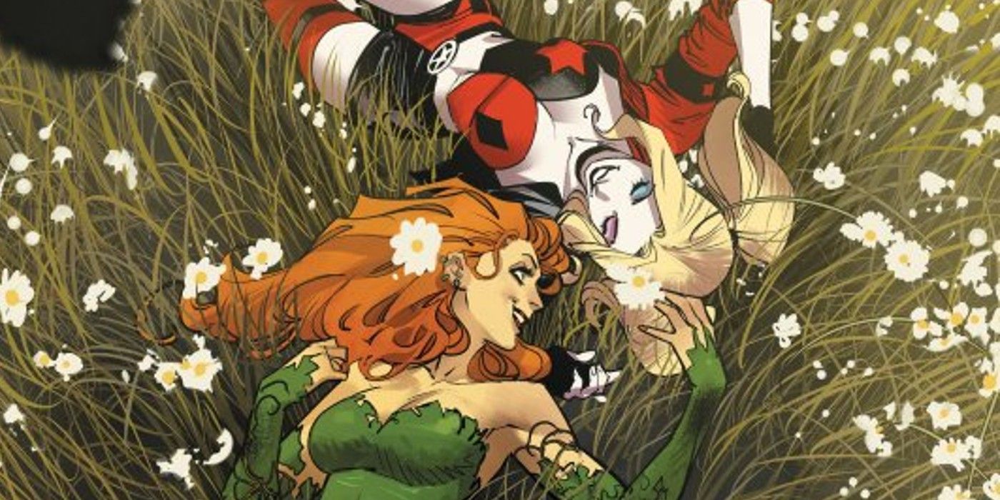 poison ivy and harley quinn are laying in a field of daisies