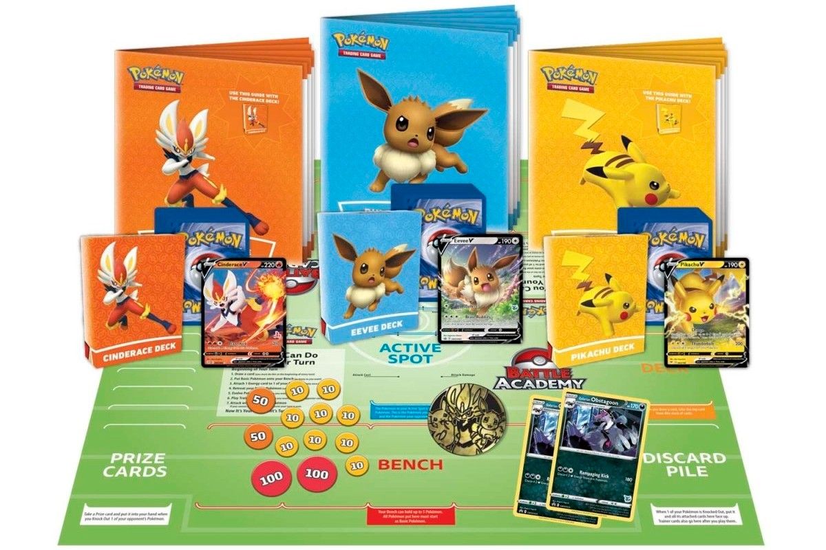 Pokemon TCG Battle Academy set laid out showing the board, card decks, and other special pieces.