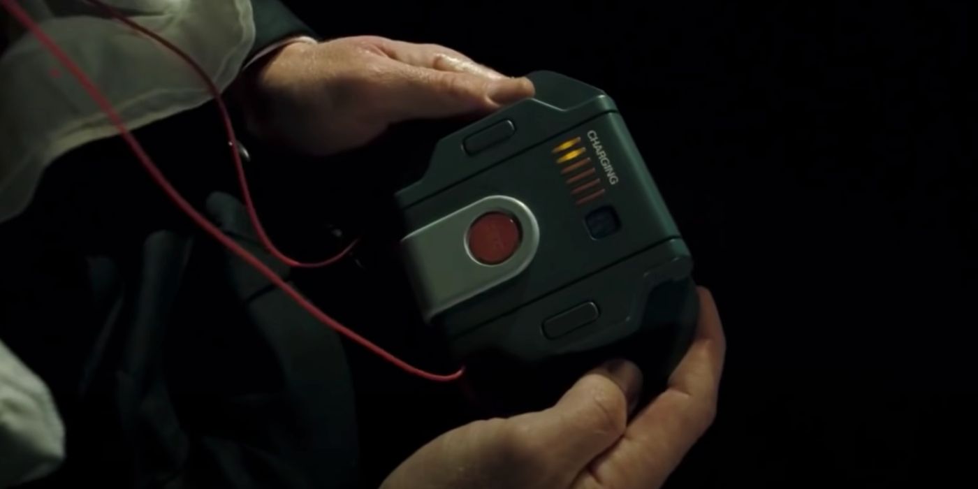 Bond holds a portable defibrillator in Casino Royale