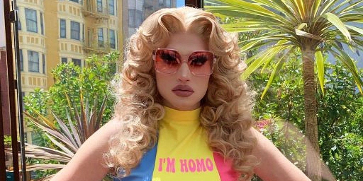 Princess Poppy RuPaul's Drag Race Season 15 wearing colorful top and big sunglasses looking serious