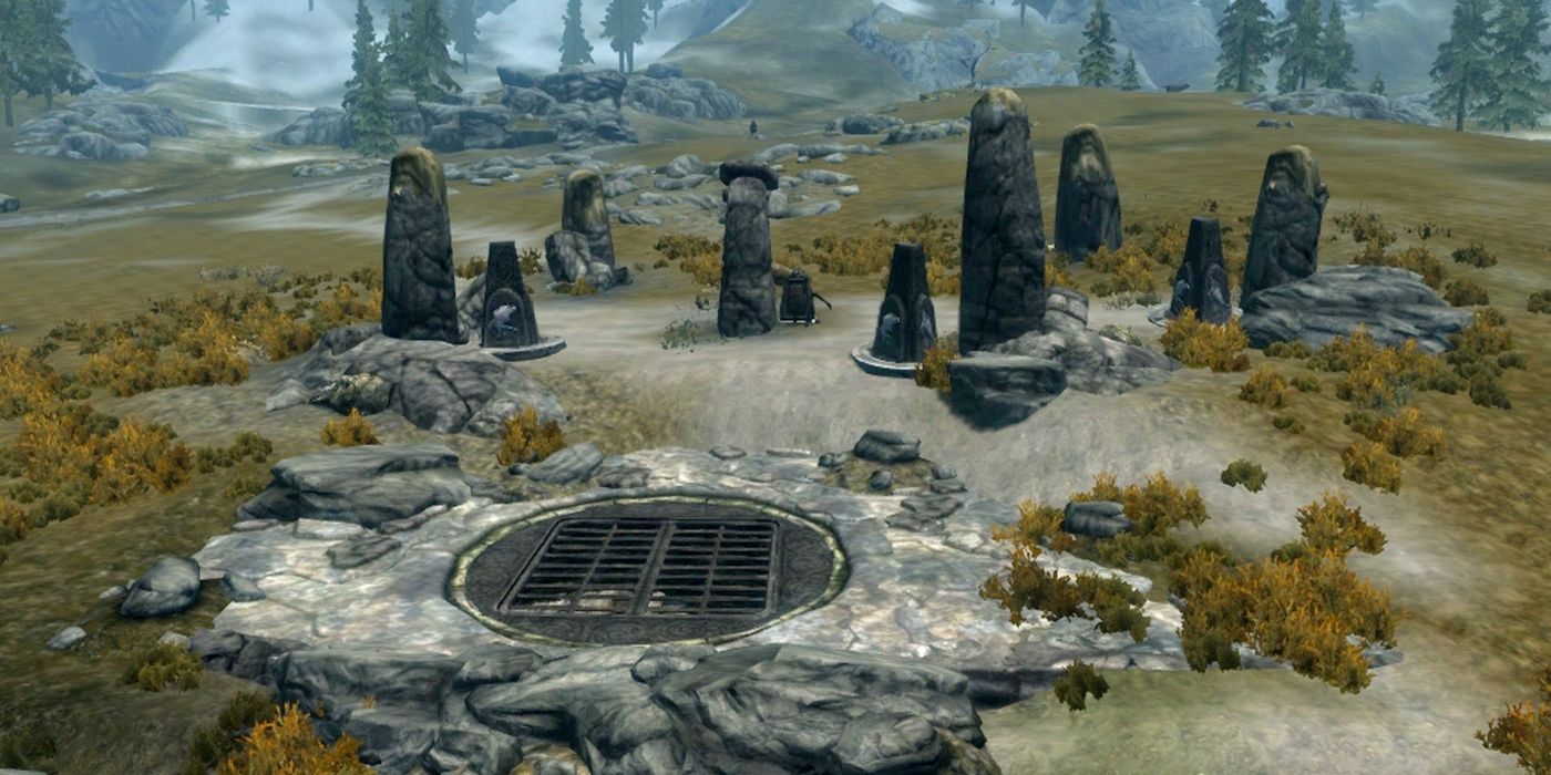 A collection of pillars, designed as a large puzzle, stand behind a grate in Skyrim.