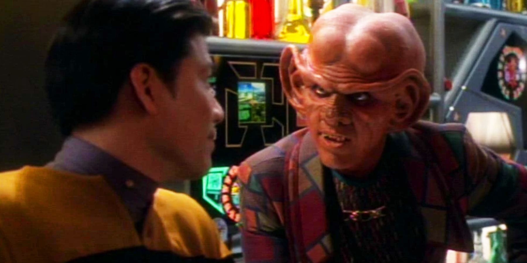 Harry Kim is served by Quark aboard DS9