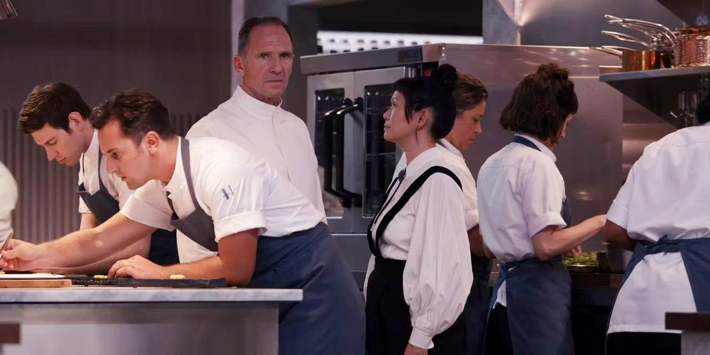 Ralph Fiennes as Chef Slowik talks to his maitre d in The Menu