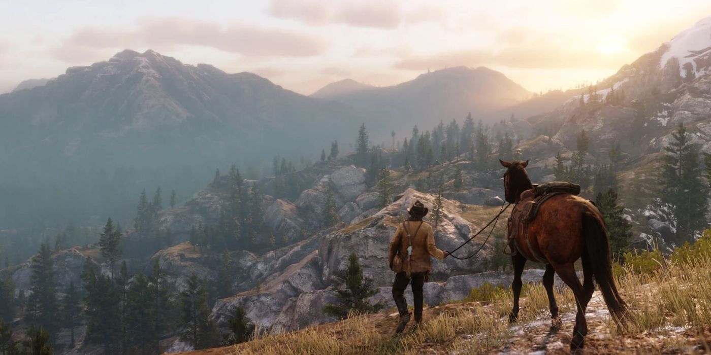 Arthur Morgan guiding his horse along the mountainside in Red Dead Redemption II.