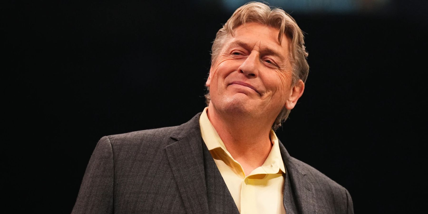 William Regal smiles at MJF during a segment leading up to AEW Full Gear in 2022.