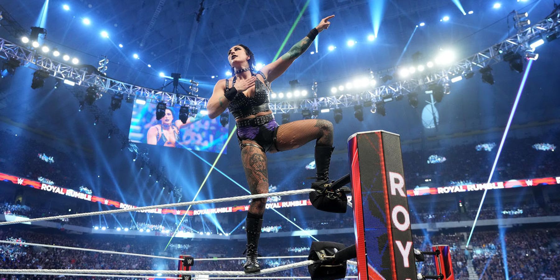 Rhea Ripley celebrates winning the 2023 women's Royal Rumble. She'd go on to challenge Charlotte Flair for a match at WrestleMania 39 on the next Raw.