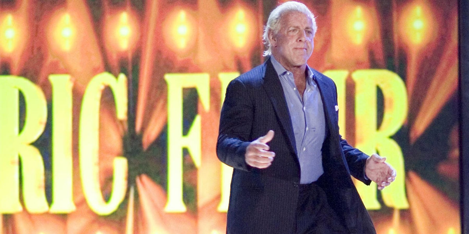 Ric Flair struts to the ring during a WWE show earlier in his career. 