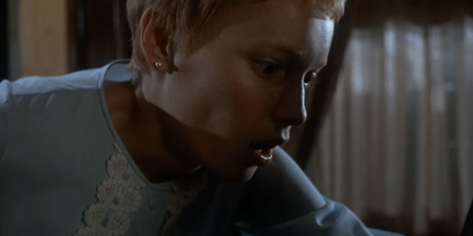 Rosemary looking down in Rosemary's baby