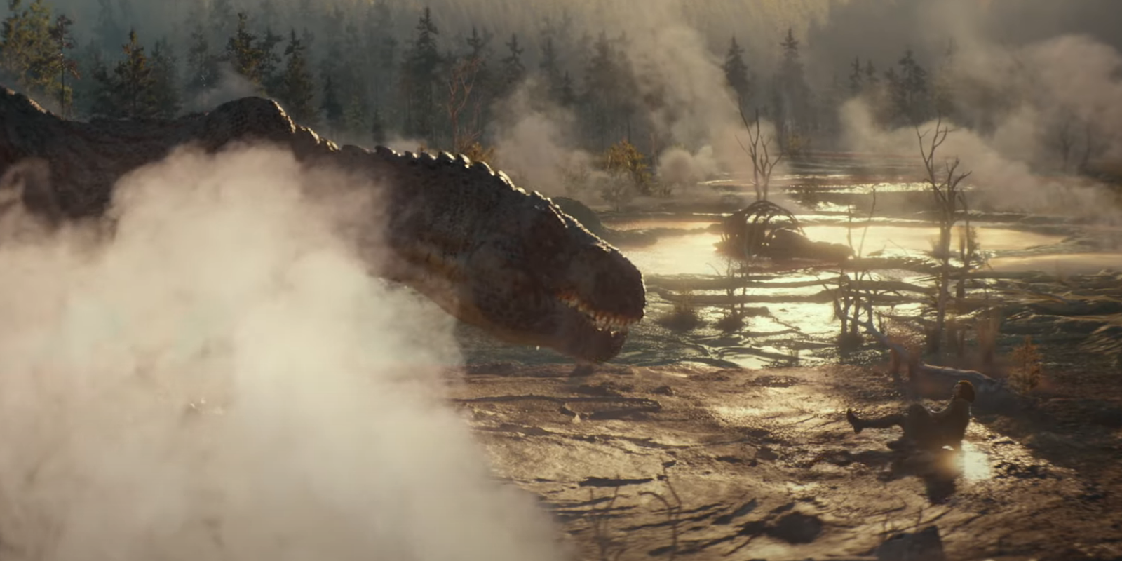 Adam Driver is fighting off a dinosaur.