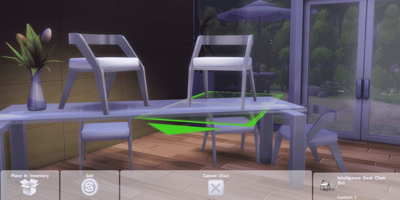 A pair of chairs lifted onto a table in The Sims 4