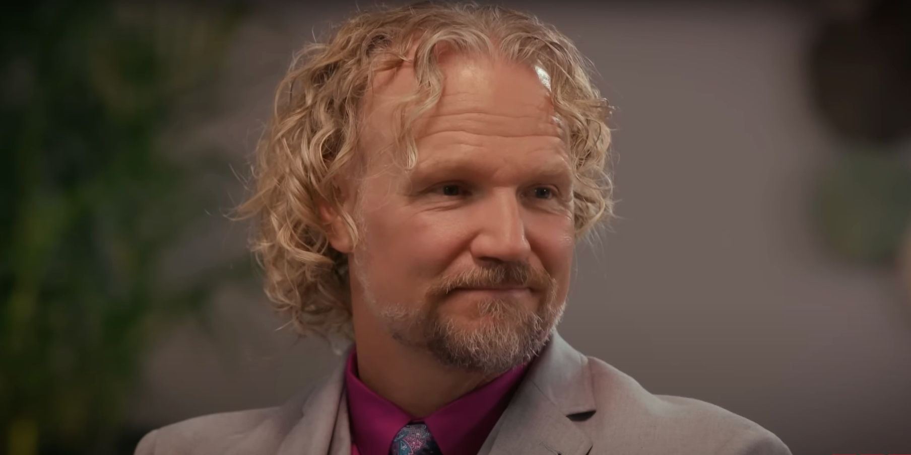 Sister Wives star Kody Brown wearing suit looking serious during season 17 Tell All