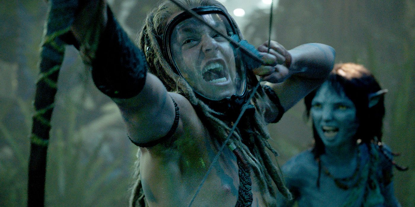 Spider (Jake Champion) shooting a bow and arrow with Kiri (Sigourney Weaver) in Avatar 2.