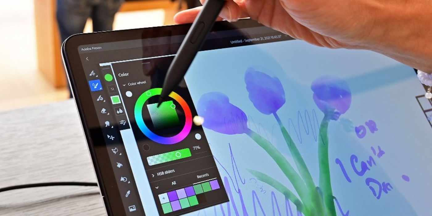 An artist uses a Surface Slim Pen Pro 2 stylus