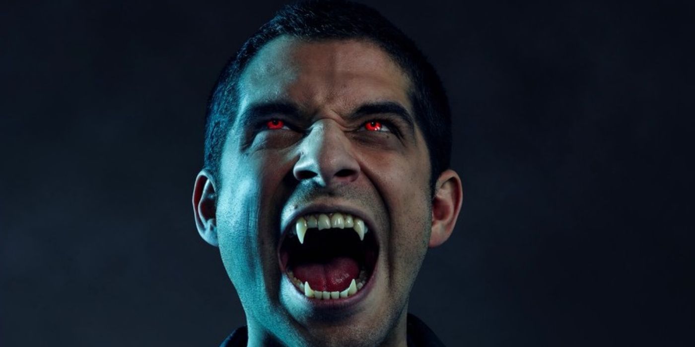 Scott looking sinister with his fang teeth and red eyes in Teen Wolf