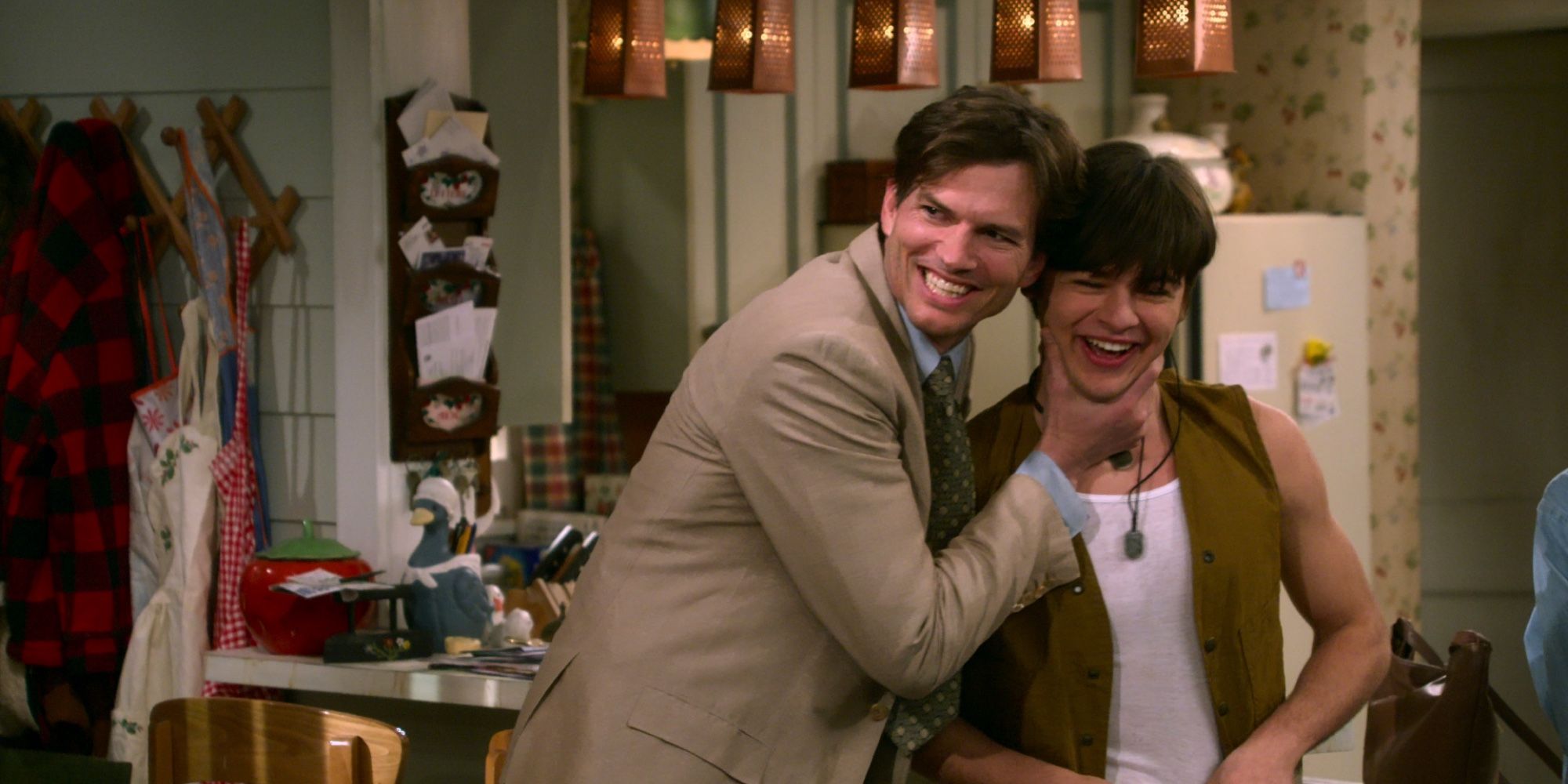 Ashton Kutcher as Michael Kelso and Mace Coronel as Jay Kelso in That 90s Show season 1