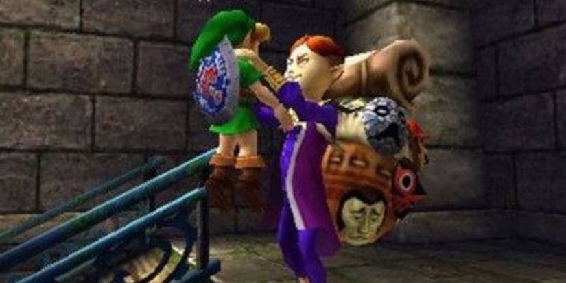 The Happy Mask Salesman lifts up a young Link in The Legend of Zelda Majoras Mask