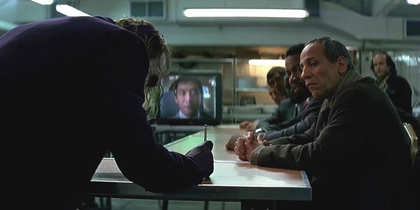 The Joker sets up the pencil trick in The Dark Knight