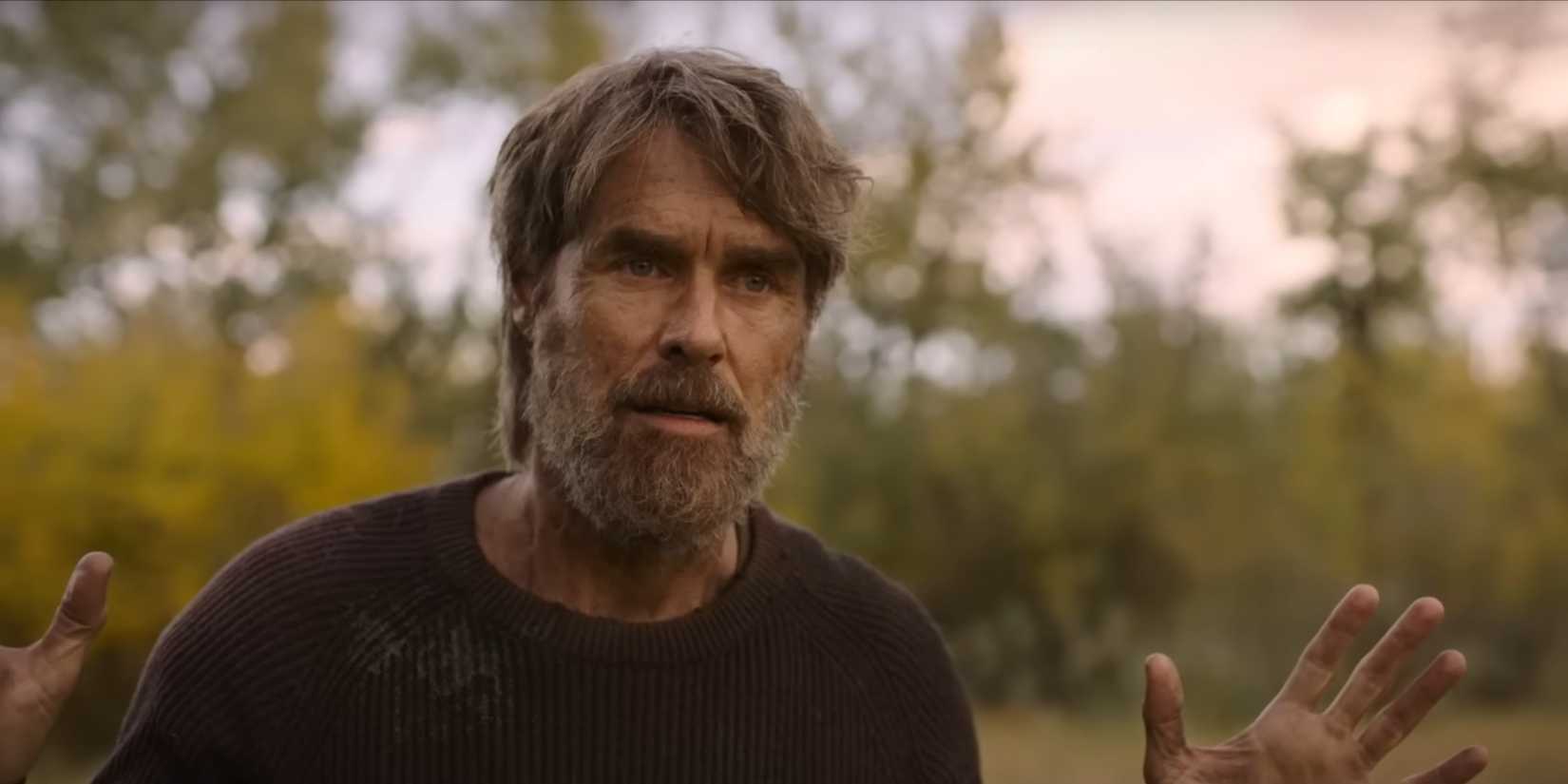 Murray Bartlett as Frank with his hands up in Last of Us episode 3