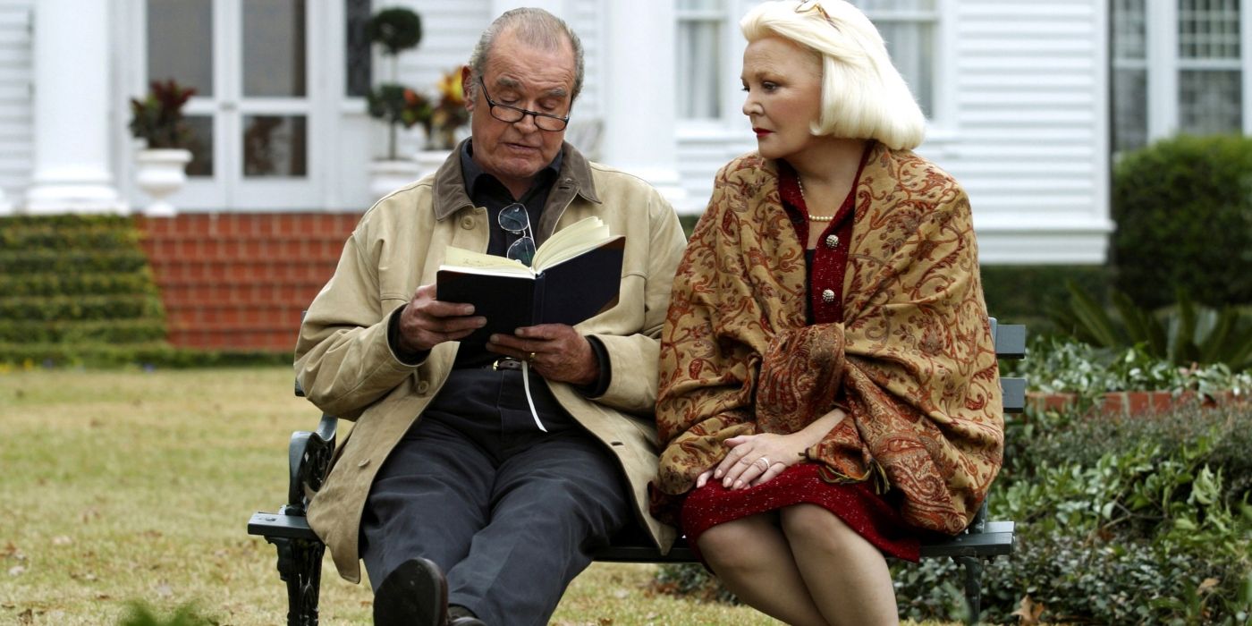 James Garner as Noah and Gena Rowlands as Noah and Allie sitting on a bench in The Notebook 